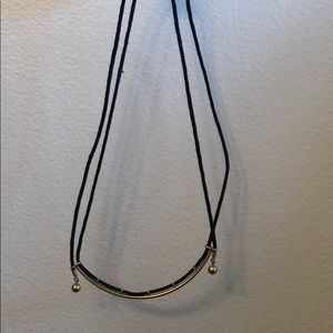 Madewell gold and black necklace.